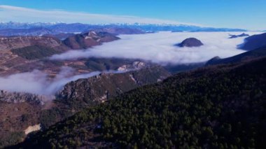 Sea of clouds in Natural Park of the Prealps of Azur from sky