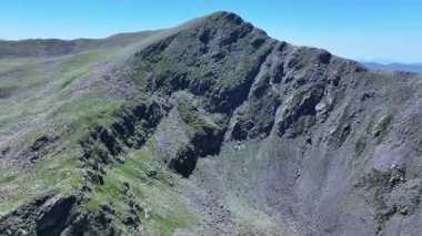 A mountain peak in Mercantour National Park seen from a drone