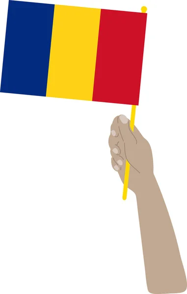Mão Segurando Bandeira Romênia — Vetor de Stock