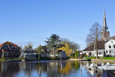 Broek in Waterland, Netherlands. February 2023. The wooden facades and old houses in Broek in Waterland, Holland. High quality photo