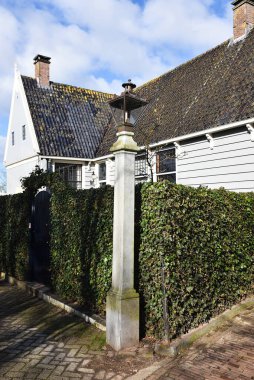 Broek in Waterland, Netherlands. February 2023. The wooden facades and old houses in Broek in Waterland, Holland. High quality photo