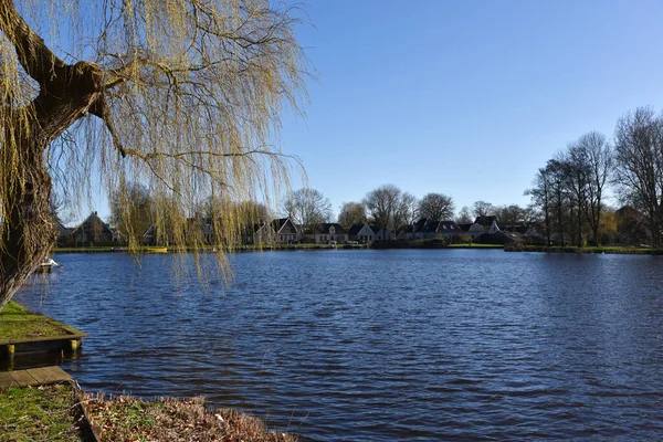 stock image Broek in Waterland, Netherlands. February 2023. View across water at Broek in Waterland. High quality photo