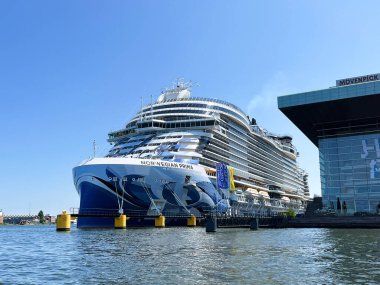Amsterdam, Netherlands. June 24, 2023. Luxury cruise ships at the quay at the Passenger Terminal Amsterdam. High quality photo clipart