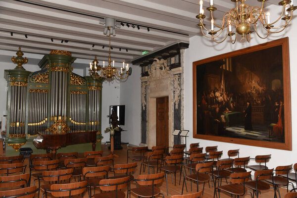 Amsterdam, Netherlands. January 20, 2024. The refectory with organ and piano in the Luther House. High quality photo