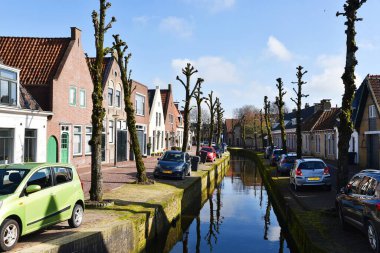 Franeker, the Netherlands. March 2, 2025. One of the canals in Franeker, Friesland. High quality photo clipart