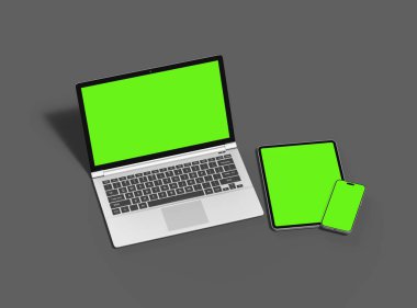 Gri arkaplanda dizüstü bilgisayar, tablet ve akıllı telefonun bir kopyası 