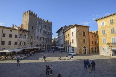 Palazzo del Comune (Town Hall) and Piazza Garibaldi at sunset, Massa Marittima, Tuscany, Italy