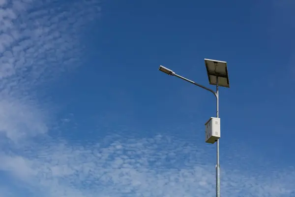 solar street light pole bright sky background