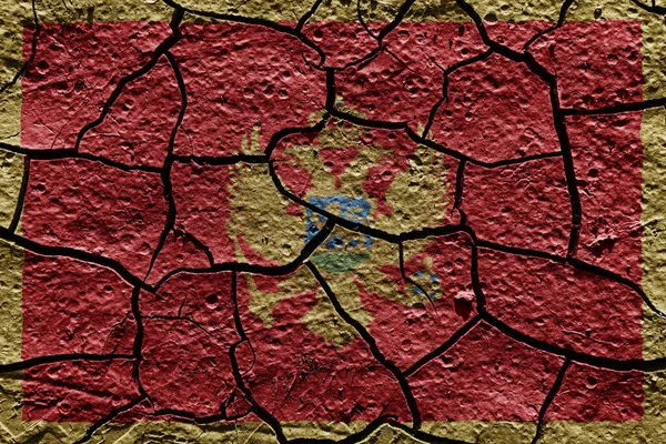 Montenegro Flag Mud Texture Dry Crack Ground — Stock Photo, Image