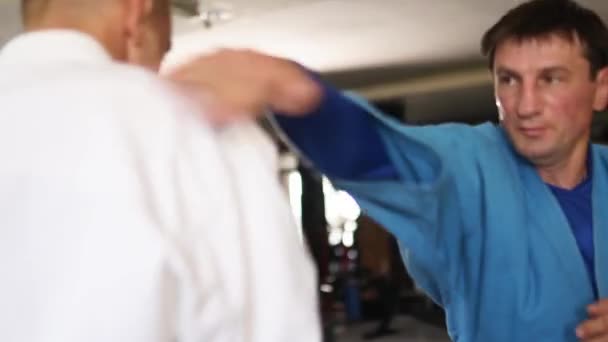 Martial Arts Men Kimonos Practice Kicks Punches Male Fighters Wearing — 비디오