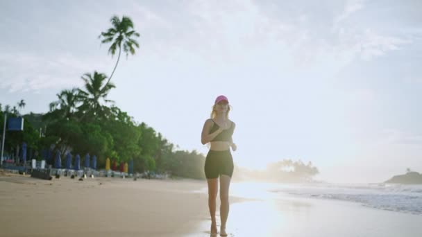 Young Blonde Woman Jogs Sea Sunrise Caucasian Female Runs Beach — Αρχείο Βίντεο