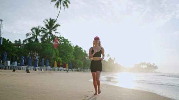 Young Blonde Woman Jogs Sea Sunrise Caucasian Female Runs Beach — Vídeo de Stock