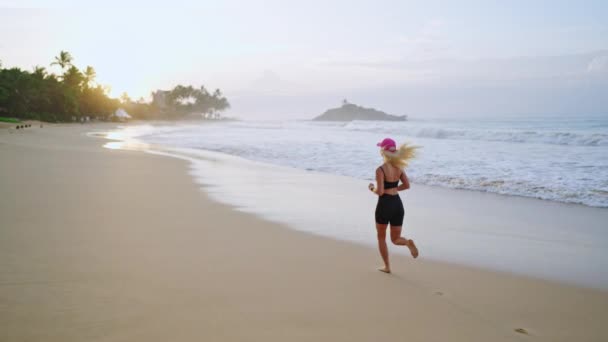 Young Blonde Woman Jogs Sea Sunrise Caucasian Female Runs Beach — стокове відео