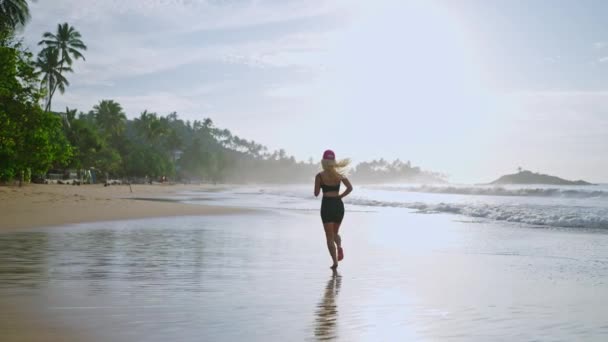 Young Blonde Woman Jogs Sea Sunrise Caucasian Female Runs Beach — Wideo stockowe