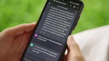 February 5, 2023, Mirissa, Sri Lanka. Using OpenAI chatGPT on phone. A woman chats with artificial intelligence. Person tests neural network language Mirissa online. Human talks to AI via GPT close-up