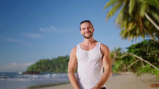 Cheerful Male Athlete Good Mood Standing Seashore Tropical Background Exotic — Wideo stockowe