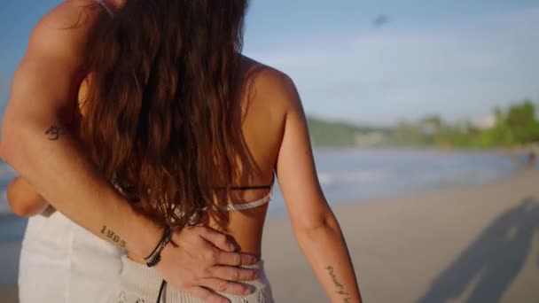 Young Biracial Couple Walks Beach Together Embracing Enjoying Summer Closeup — Stock video