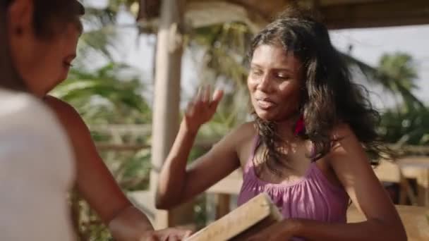 Diverse Women Friends Outdoor Restaurant Reading Menu Multiracial Girls Sitting — Stock Video