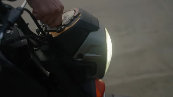 Biker Hand Inserts Key Ignition Motorcycle Turns Start Motor Headlamp — Stock Video