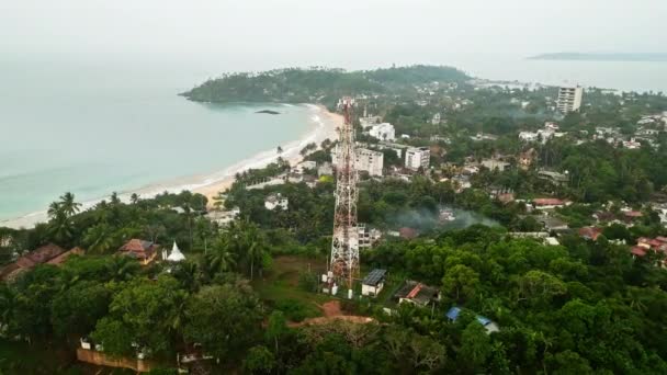Aerial View Showcases Towering Communication Mast Lush Tropical Island Landscape — Stock Video