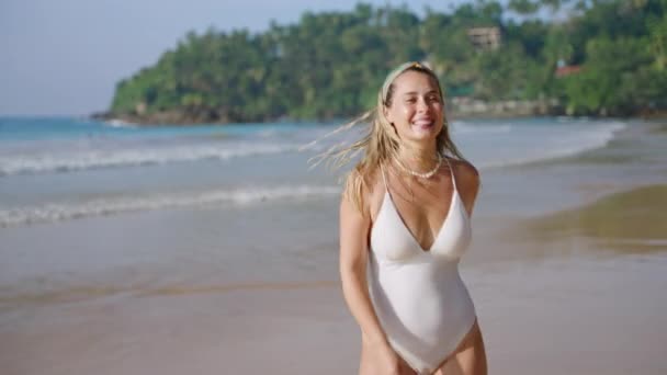 Happy Young Woman Bikini Spins Jumps Dances Invites Swiming Sea — Stock Video