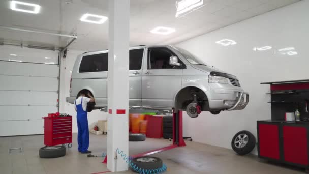 Professional Works Vehicle Adjusts Parts Conducts Maintenance Auto Mechanic Repairs — Stock Video