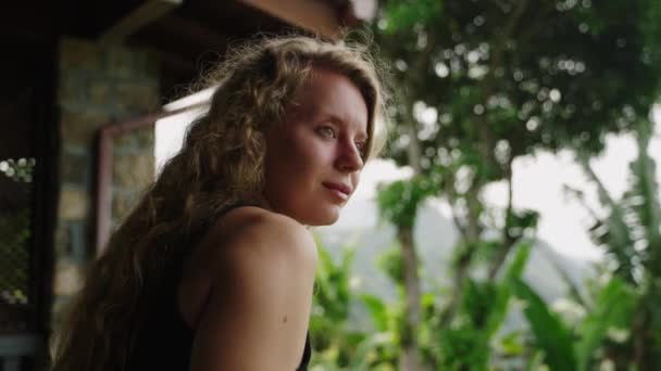 Curly Haired Female Contemplation Serene Scenic Resort View Elegant Woman — Stock Video