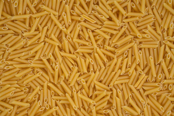 Top View Photo Yellow Dry Macaroni Noodles Stacked White Background — Stock Photo, Image