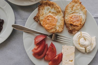 Simple European breakfast served in the guesthouse for travellers.