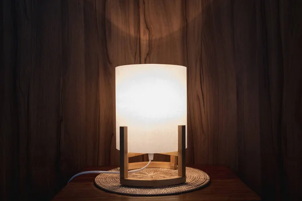Classic wooden lamp with soft warm light made of bamboo.