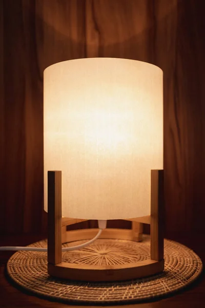Classic wooden lamp with soft warm light made of bamboo.