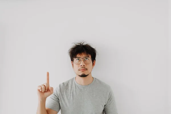 Bored Face Asian Man Pointing Empty Space Advertisement Isolated White — Stock Photo, Image