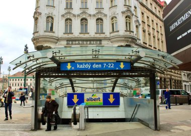 Prague, Czech Republic - January 28 2016: Modern Subway Entrance in Historic European City Center with Escalators and Signage. High quality photo clipart