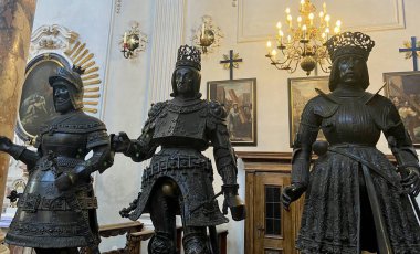 Innsbruck, Austria - September 29 2024: Armored Statues of Emperor Maximilian Is Court in Hofkirche. High quality photo clipart