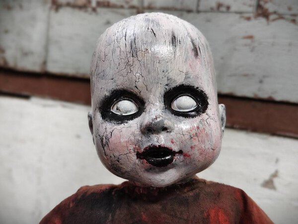 Scary horror doll Creepy doll Halloween concept, Close up of Ghost doll mystic in abandoned places background