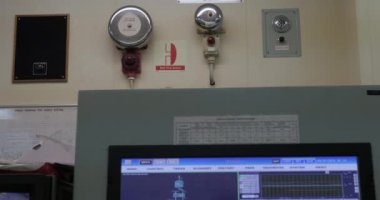 Bells of emergency alarm in engine control room of ship