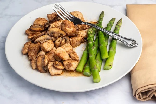 Season Chicken Bites Top Mushrooms Served Asparagus Royalty Free Stock Images