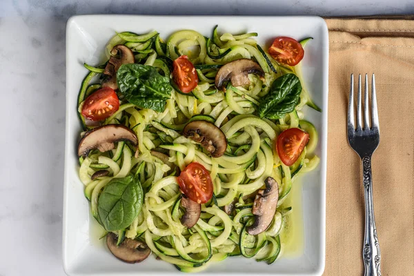 Zucchini Noodles Served Sauteed Mushrooms Tomatoes Spinach Stock Image