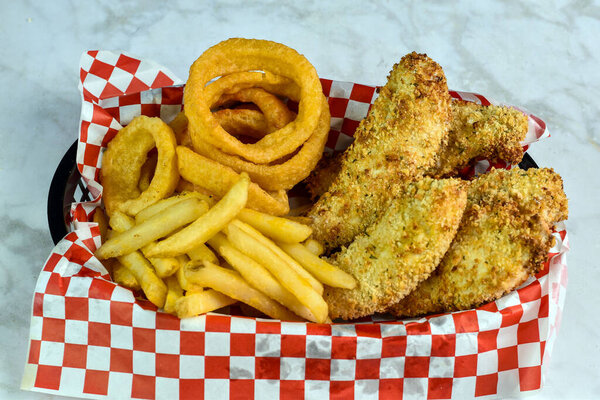  crispy chicken fingers served with french fries and onion rings