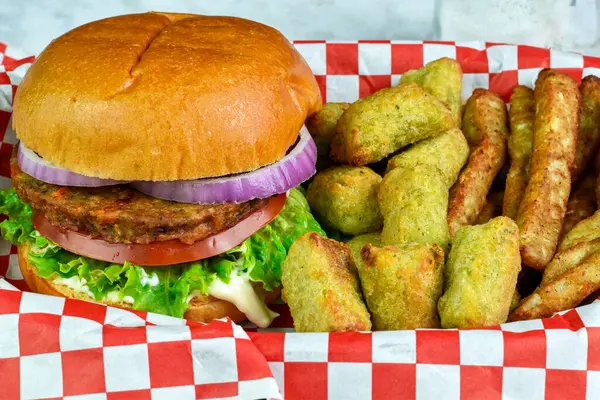 veggie burger served with  veggie  tots and broccoli fries