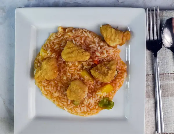 stock image sweet and sour chicken srved with rice