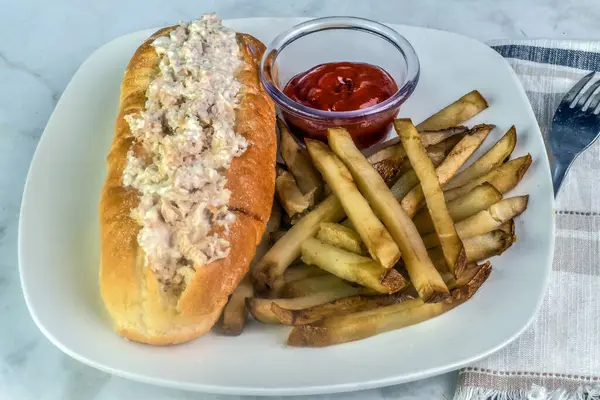 stock image  ham salad sub  served with home made french fries