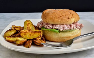 spam salad sandwich  served with  potato wedges,  clipart