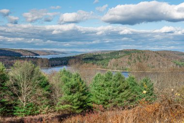 a scenic veiw  of the quabbin reservoir from the enfield look out  located in ware massachusetts clipart