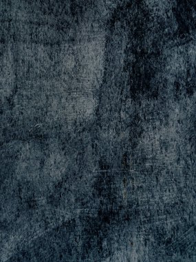 Koyu grunge arkaplan dokusu pürüzlü yüzeyi çiziklerle gösteriyor
