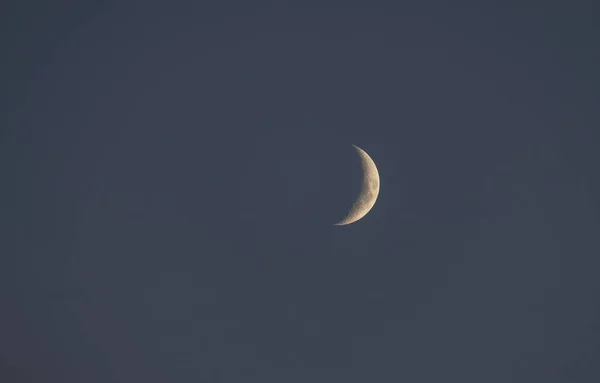 A new moon on a calm night with clear sky