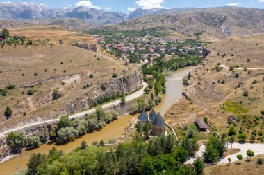 Kemah district city entrance. View of Sultan Melik Tomb and Karasu River.