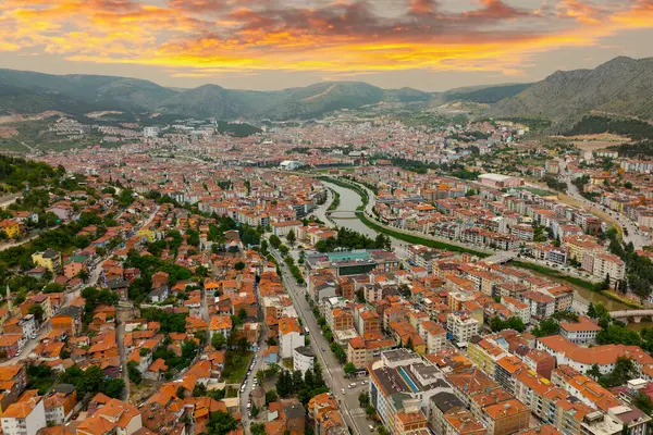 stock image Fascinating view of the city of Amasya, also known as the city of princes. wonderful clouds coming out of the mountains. YESILIRMAK river.