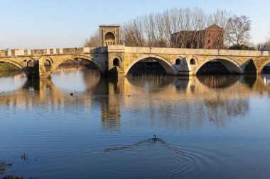 Tunca bridge over Tunca river and Selimiye Mosque in Edirne clipart