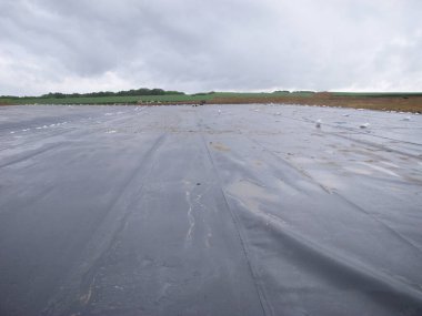 Açılan HDPE sentetik yolcu gemisiyle depolama projesi. Yüksek kalite fotoğraf